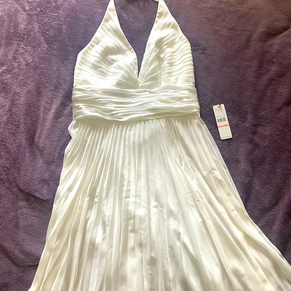 Laundry brand, cream color (alabaster), size 10, ladies cocktail/evening dress.